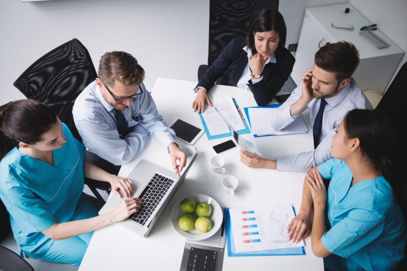Team of doctors in a meeting at conference room Team of doctors in a meeting at conference room